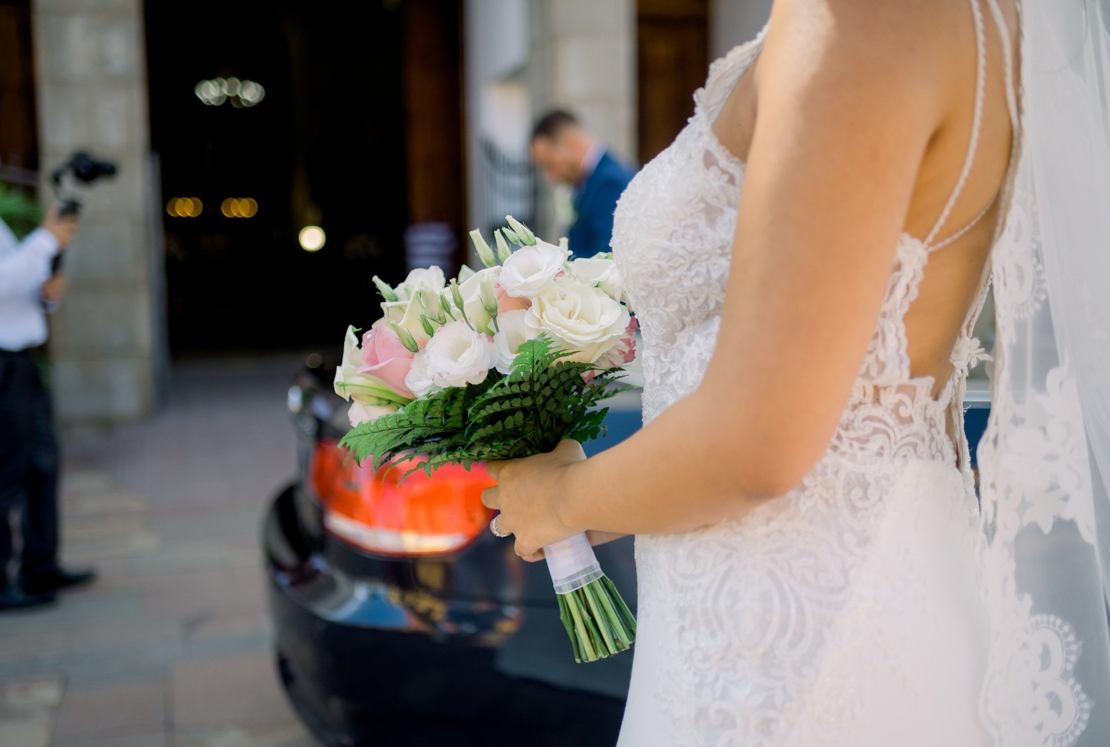 Crop woman during wedding celebration on street